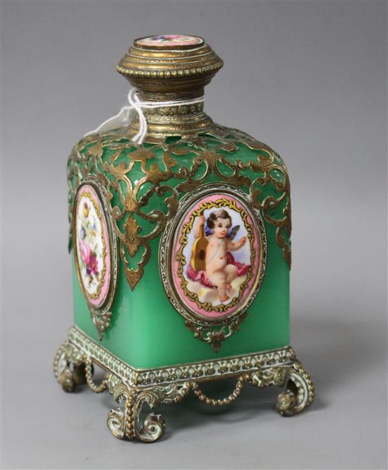 A 19th century French gilt metal mounted glass scent bottle, inset with painted and enamelled plaques, height 13cm